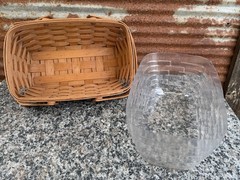 vintage 1993 Longaberger hand-woven handled basket with a clear plastic liner