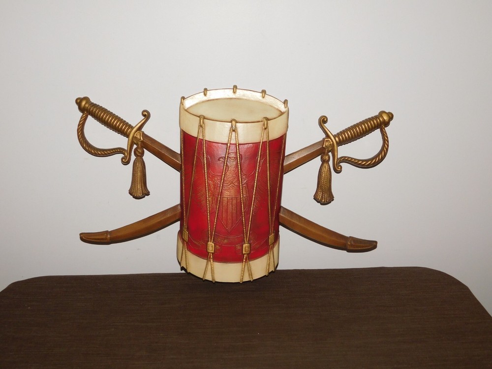VINTAGE 20″ WIDE 12″ HIGH SEXTON METAL DRUM & SWORDS WALL HANG PLAQUE