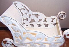 VINTAGE UNBRANDED GLITTERED METAL WHITE SCROLLED SLEIGH