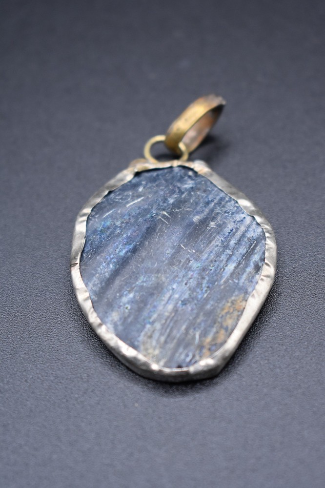 Ancient Roman shard of glass wrapped, 1st-2nd century AD