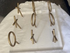 Clear/Gold Acrylic Base Metal Rings & X Decor Display Stand, Decorative