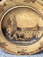 VINTAGE 8.5” PYROGRAPHY WOODEN PLATE-“HUNFELD KIOSTER” FOLK ART