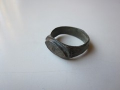 unique ancient Viking engraved relief massive bronze ring with runes.IX – X AD.