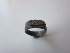 unique ancient Viking engraved relief massive bronze ring with runes.IX – X AD.