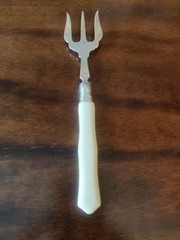 Antique 1913 Edwardian silver collared Trident searing fork