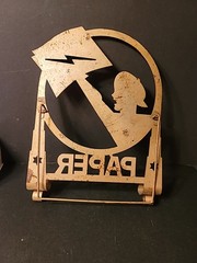 Art Deco 1930s Tin Newspaper Boy Lightning Bolt Collapsible Rack Feet Gold Paint