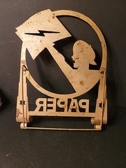 Art Deco 1930s Tin Newspaper Boy Lightning Bolt Collapsible Rack Feet Gold Paint