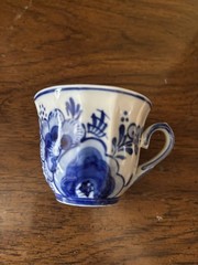 Delft Blue and white demitasse cup and saucer. Hand painted Holland