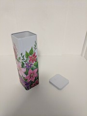 A 9 5/8″ Tall Square Tin with Raised Floral Décor Made in the United Kingdom