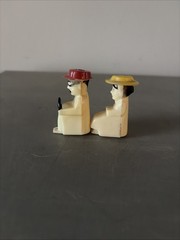 RARE ANTIQUE 1940s50s60s plastic man&woman driving Salt And Pepper Shakers Set