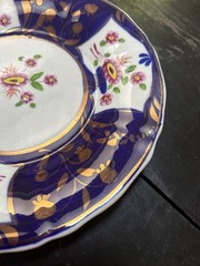 Gaudy Welsh flower plate w copper luster details cobalt blue 8 1/2” D