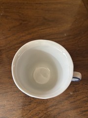 Delft Blue and white demitasse cup and saucer. Hand painted Holland