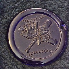 cobalt blue glass medallion, likely made In Turkey With A Signature 1990s