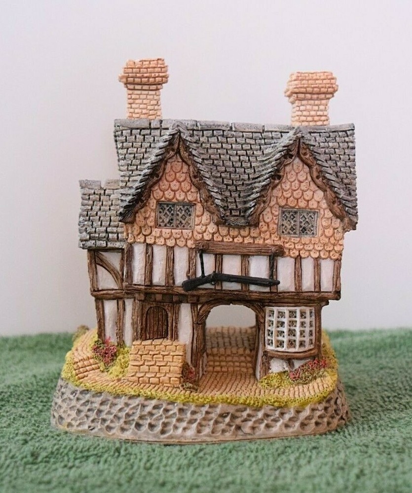 David Winter Cottages Gunsmiths Cottage. In original box.