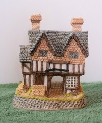 David Winter Cottages Gunsmiths Cottage. In original box.