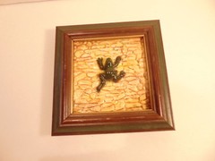 Modern framed decorative tile with high relief frog; Studio label on reverse