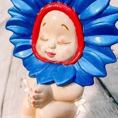 Vtg Ceramic Sunflower Baby Figurine Hand Crafted Flower Head Gold Blue Figure