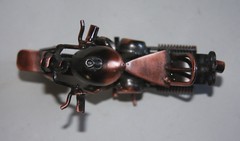 Heavy Welded Motorcycle Sculpture Bronze Nick-Knack Rolling Wheels 5 1/2″x 3 1/4