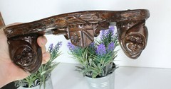 Miniature gothic heads ceramic wall console