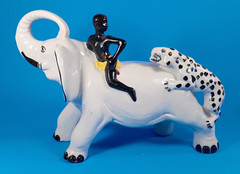 Man Riding Elephant As Jaguar Attacts Ceramic Figure. Made in Brazil. 12″x8″x5″