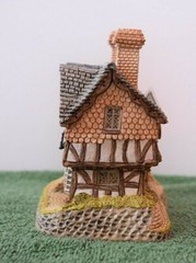 David Winter Cottages Gunsmiths Cottage. In original box.