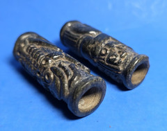 PAIR OF PRE-COLUMBIAN MAYAN SERPENTINE TUBULAR NECKLACE BEADS WITH GLYPHS