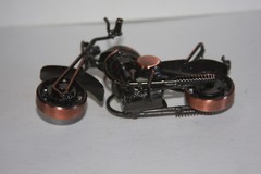 Heavy Welded Motorcycle Sculpture Bronze Nick-Knack Rolling Wheels 5 1/2″x 3 1/4