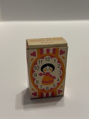 Avon Small World Fragrance Watch 1971 Girl Black Hair Orange Dress VTG With Box