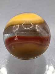 .76″ Akro Corkscrew Popeye Red, Yellow, White, Clear Shooter Marble- #CE138