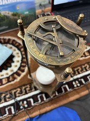 vintage maritime brass sand timer hourglass with sundial compass on top