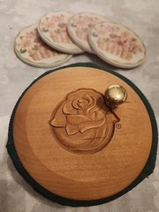 Longaberger Sunflower Pottery Coaster Set featuring handcrafted ceramic coasters