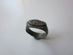 unique ancient Viking engraved relief massive bronze ring with runes.IX – X AD.
