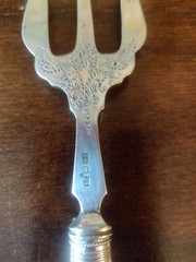 Antique 1913 Edwardian silver collared Trident searing fork