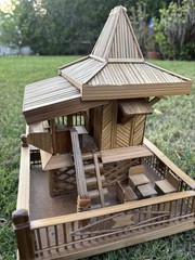 Traditional Intricate Asian/Doll Model house made of bamboo – has light inside
