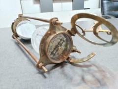 vintage maritime brass sand timer hourglass with sundial compass on top