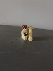 RARE ANTIQUE 1940s50s60s plastic man&woman driving Salt And Pepper Shakers Set