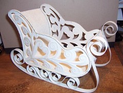 VINTAGE UNBRANDED GLITTERED METAL WHITE SCROLLED SLEIGH