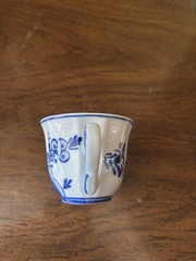 Delft Blue and white demitasse cup and saucer. Hand painted Holland
