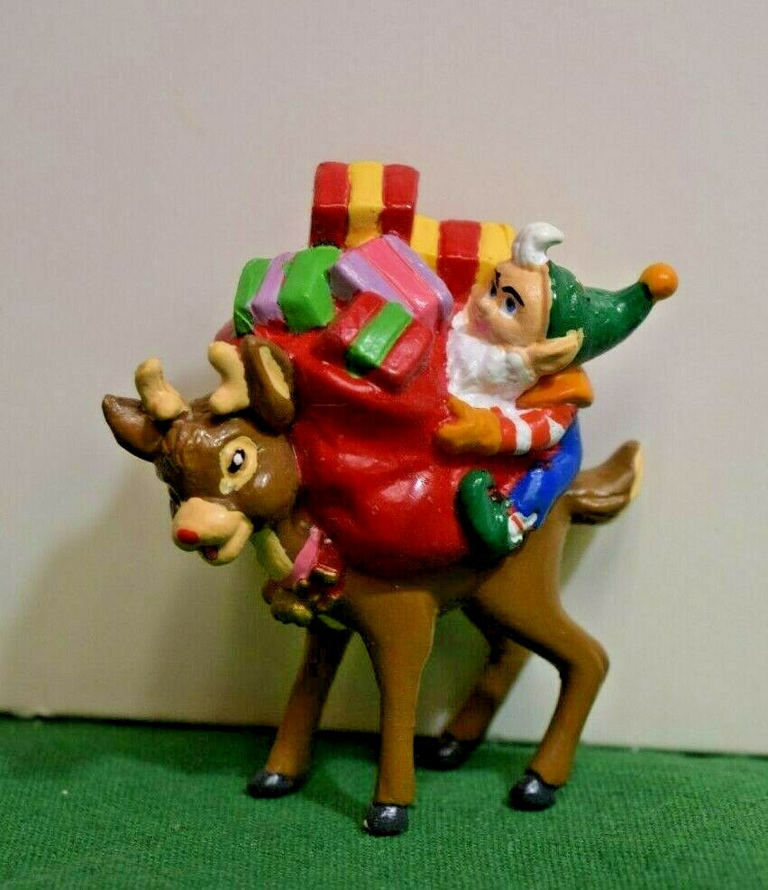 Elf on Rudolph Applause 50th Anniversary Plastic Figurine. Mint in box.