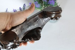 Miniature gothic heads ceramic wall console