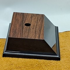 Trophy base, black plastic, woodgrain top, 3 7/6″W x 3 1/8″L x 1 1/4″H, #F.P.35