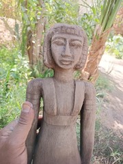 Ancient egyptian antique tall wooden female sculpture with carved hair and dress