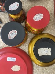 Collection of traditional Russian Khokhloma hand-painted wooden ware.