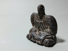 CIRCA NEAR EASTERN BLACK STONE SEATED BIRD.