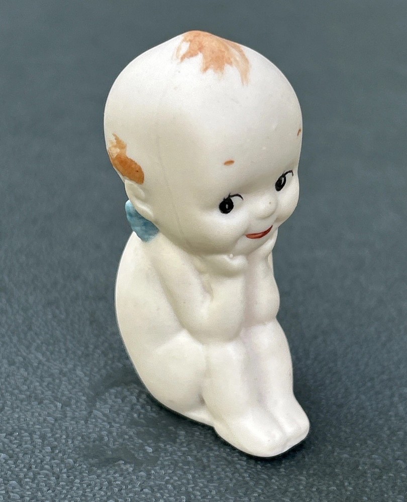Kewpie Doll with Blue Wings Porcelain Sitting Figurine 2.25″- Unknown Marking