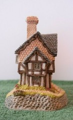 David Winter Cottages Gunsmiths Cottage. In original box.