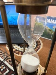 vintage maritime brass sand timer hourglass with sundial compass on top