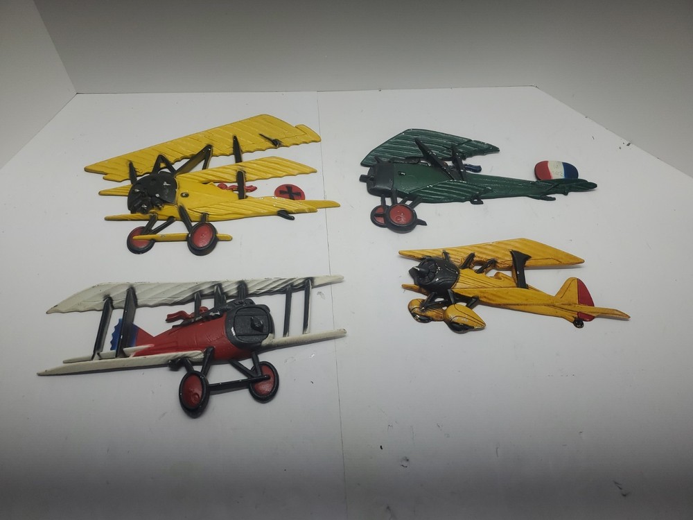 Vintage 1975 Homco Iron Airplanes Set of 4