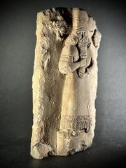 LARGE ASSYYRIAN STONE CARVED PLAQUE DEPICTING MALE RULER UNDER THE SUN AND STARS
