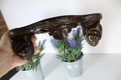 Miniature gothic heads ceramic wall console